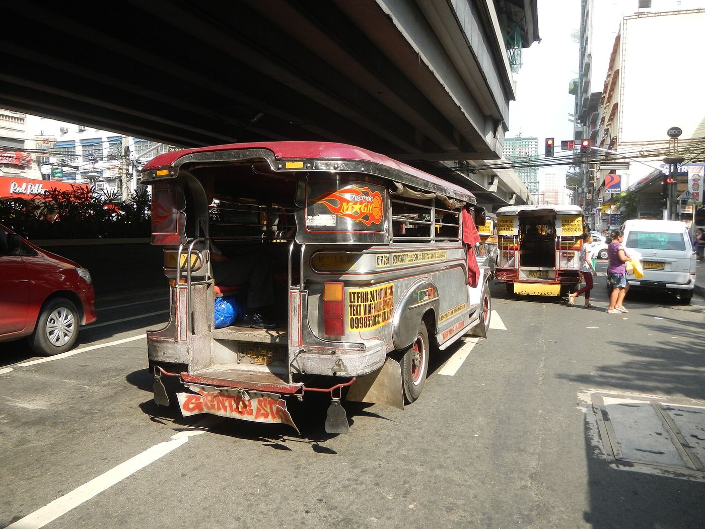 A traditional jeepney in traffic in Metro Manila, where the government has set a year-end deadline for the vehicles to be replaced.