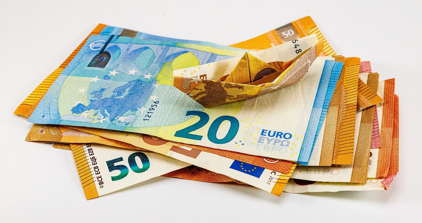 Euro banknotes and coins. The currency has gained about 9 percent against the dollar over the past year.
