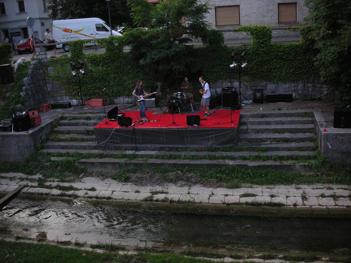 Café terraces along the Ljubljanica River in central Ljubljana, where merchants are accepting the pilot digital euro.