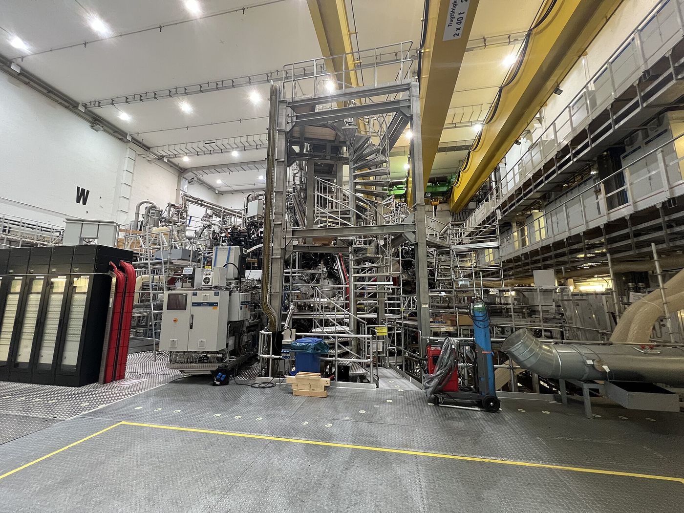 The interior of a stellarator’s plasma vessel, lined with carbon tiles to withstand temperatures of millions of degrees.
