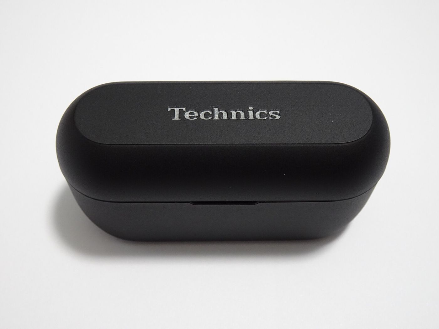 Wireless earbuds in a charging case; a newly approved model can be tuned to compensate for hearing loss.
