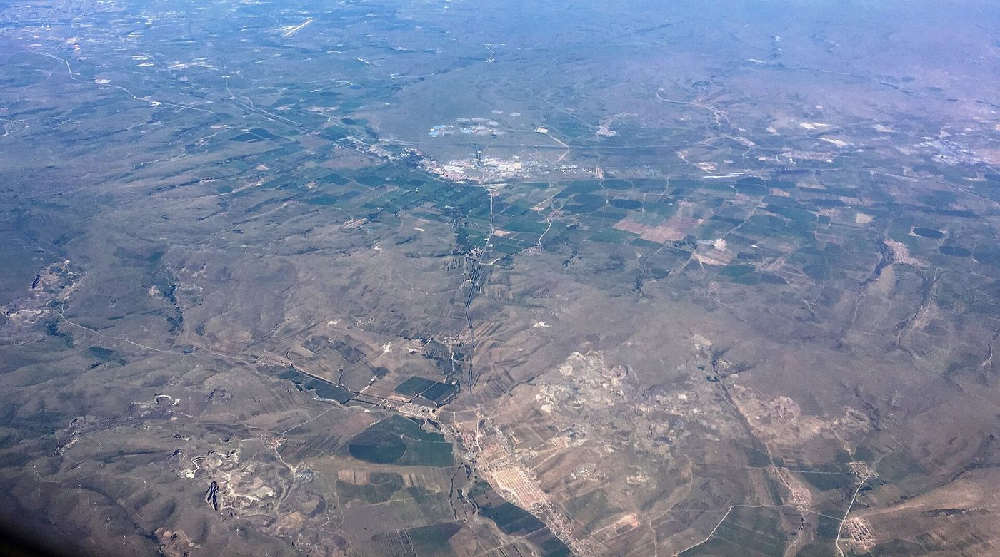 An open-pit mine seen from the air.
